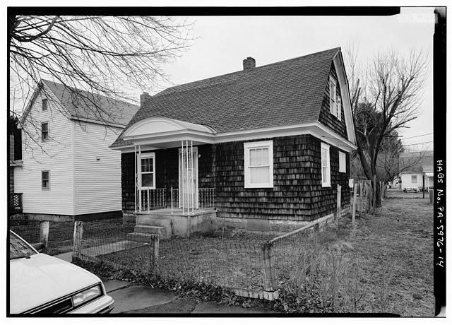 14. CLOSE VIEW OF VERMONT FARMHOUSE-STYLE HOME WITH ORIGINAL PORCH ROOF AND SIDING, NO. 43 POPLAR STREET. - Town of Kistler, Kistler, Mifflin County, PA