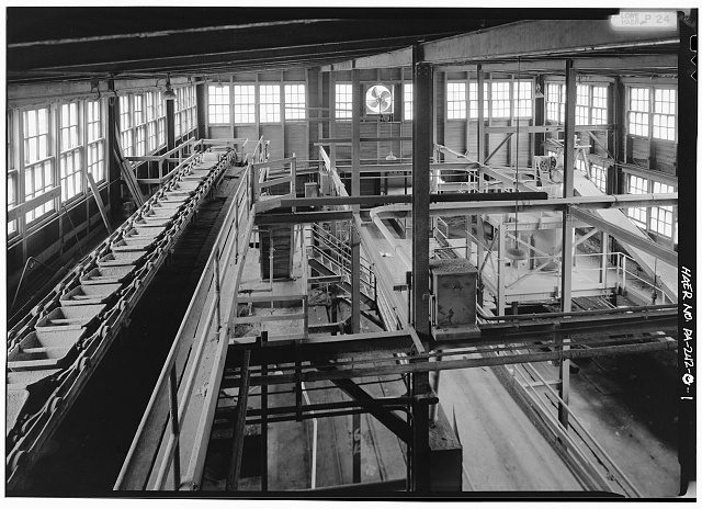 1. INTERIOR VIEW OF MOLDING ROOM, NO. 2 WORKS, SHOWING BUCKET LINE FEEDING MOLDING MACHINES - Harbison-Walker Refractories Company, Molding Room